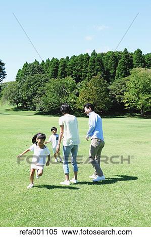 Happy Japanese family in a city park View Large Photo Image Stock Photography - Happy Japanese family in a city park. Fotosearch