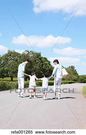 Happy Japanese family in a city park View Large Photo Image Stock Photography - Happy Japanese family in a city park. Fotosearch