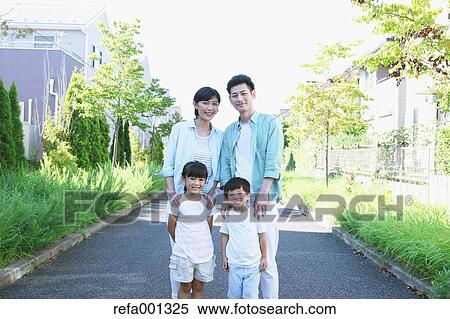 Happy Japanese family in a city park View Large Photo Image Stock Photography - Happy Japanese family in a city park. Fotosearch
