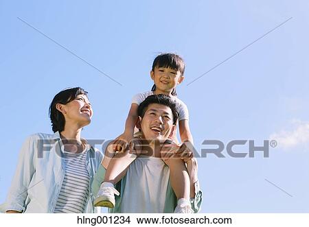Happy Japanese family smiling View Large Photo Image Picture - Happy Japanese family smiling. Fotosearch