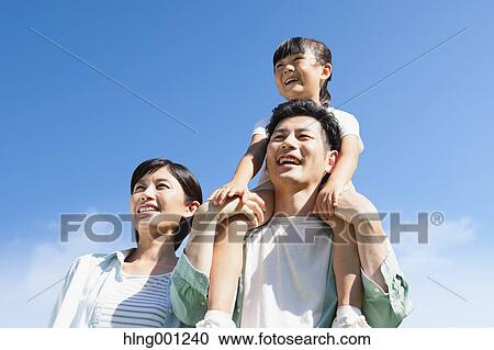 Happy Japanese family smiling View Large Photo Image Stock Image - Happy Japanese family smiling. Fotosearch