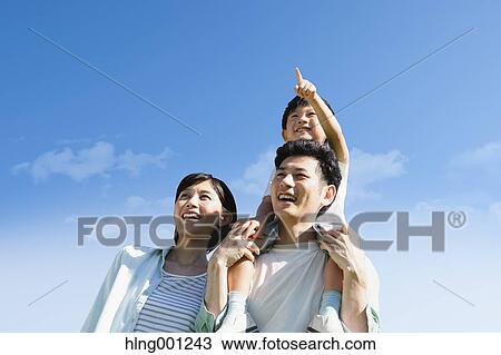 Happy Japanese family smiling View Large Photo Image Stock Image - Happy Japanese family smiling. Fotosearch