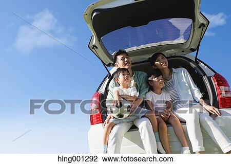 Happy Japanese family with car and blue sky View Large Photo Image Stock Image - Happy Japanese family with car and blue sky. Fotosearch