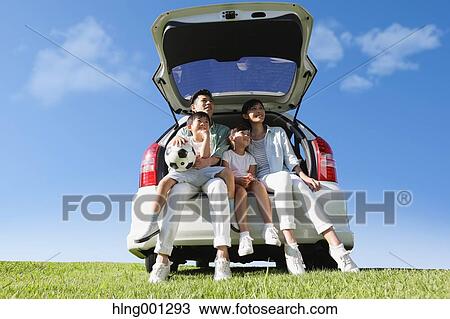 Happy Japanese family with car in a city park View Large Photo Image Stock Image - Happy Japanese family with car in a city park. Fotosearch