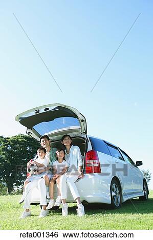Happy Japanese family with car in a city park View Large Photo Image Stock Photograph - Happy Japanese family with car in a city park. Fotosearch