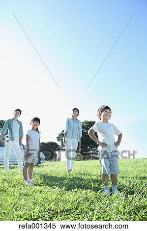 Happy Japanese family with car in a city park View Large Photo Image Stock Photography - Happy Japanese family with car in a city park. Fotosearch