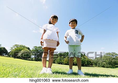 Happy Japanese kids in a city park View Large Photo Image Stock Image - Happy Japanese kids in a city park. Fotosearch