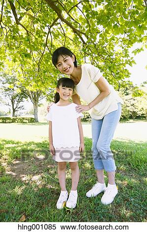 Japanese mother and daughter in a city park View Large Photo Image Stock Photography - Japanese mother and daughter in a city park. Fotosearch