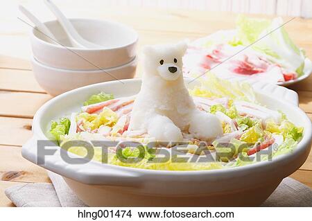 Japanese style casserole with grated radish animal decoration View Large Photo Image Picture - Japanese style casserole with grated radish animal decoration. Fotosearch