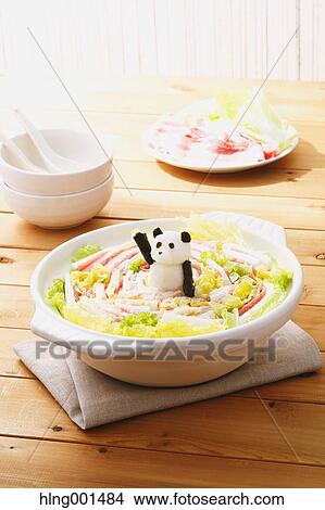 Picture - Japanese style casserole with grated radish animal decoration. Fotosearch