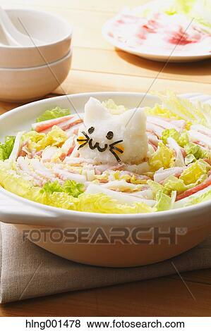 Stock Photo - Japanese style casserole with grated radish animal decoration. Fotosearch