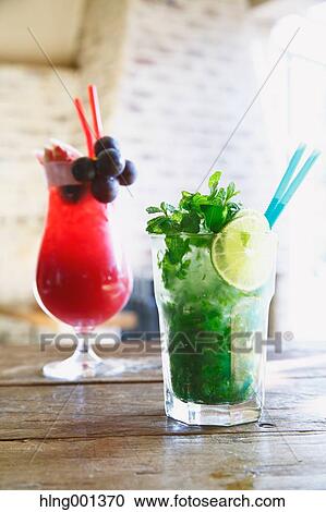 Mojito and Singapore Sling View Large Photo Image Stock Image - Mojito and Singapore Sling. Fotosearch