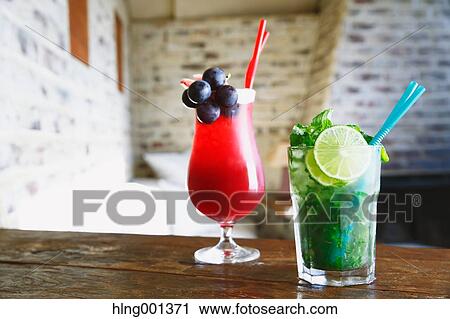 Mojito and Singapore Sling View Large Photo Image Stock Image - Mojito and Singapore Sling. Fotosearch