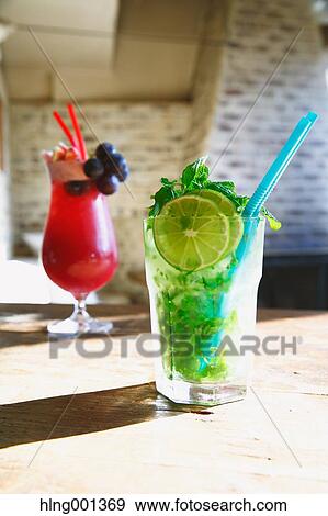 Mojito and Singapore Sling View Large Photo Image Stock Photo - Mojito and Singapore Sling. Fotosearch
