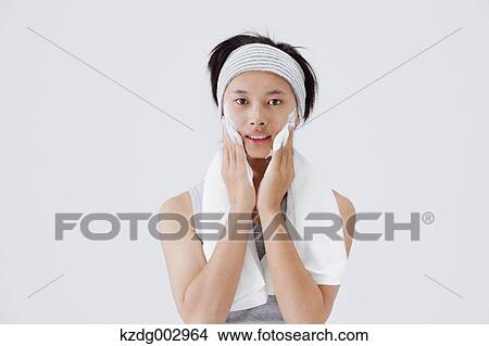 Portrait of young man doing skin care View Large Photo Image Picture - Portrait of young man doing skin care. Fotosearch