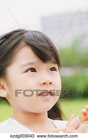 Stock Image - Young girl portrait. Fotosearch