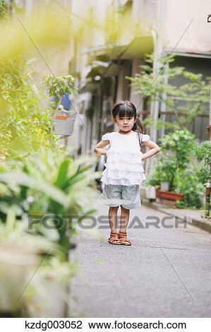 Stock Image - Young girl portrait. Fotosearch