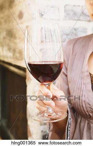 Young Japanese woman tasting wine in a fashionable bar View Large Photo Image Stock Photography - Young Japanese woman tasting wine in a fashionable bar. Fotosearch