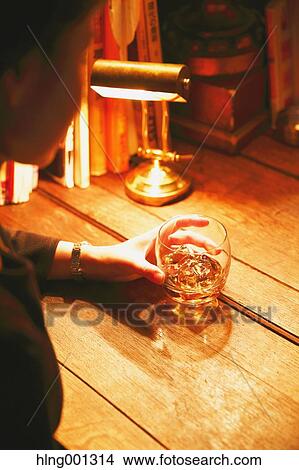 Young Japanese woman with glass of whiskey in a fashionable bar View Large Photo Image Picture - Young Japanese woman with glass of whiskey in a fashionable bar. Fotosearch