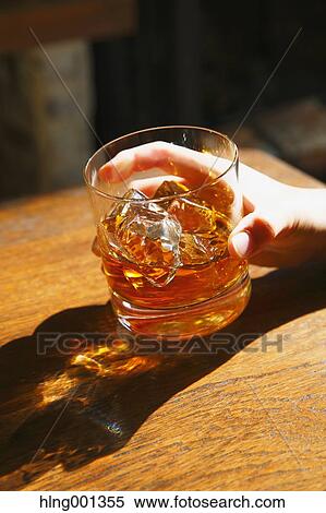 Young Japanese woman with glass of whiskey in a fashionable bar View Large Photo Image Stock Photography - Young Japanese woman with glass of whiskey in a fashionable bar. Fotosearch