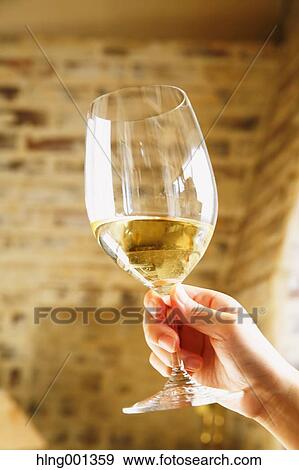 Young Japanese woman with glass of wine in a fashionable bar View Large Photo Image Stock Photo - Young Japanese woman with glass of wine in a fashionable bar. Fotosearch