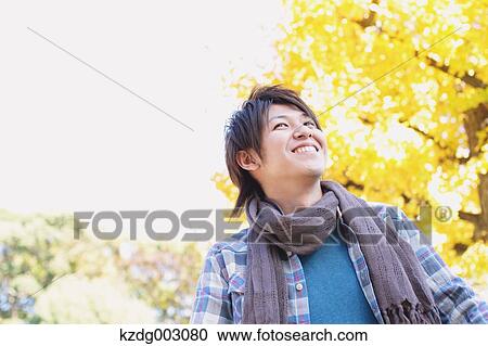 Young man looking away View Large Photo Image Stock Image - Young man looking away. Fotosearch