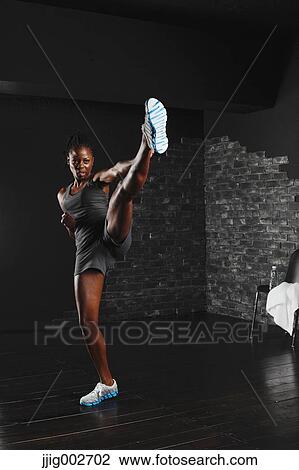 African Woman Kicking View Large Photo Image Stock Image - African Woman Kicking . Fotosearch