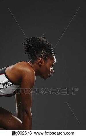 African Woman Runner Preparing To Start View Large Photo Image Stock Photo - African Woman Runner Preparing To Start. Fotosearch