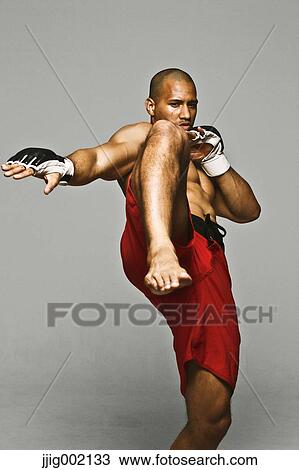 Bald male athlete in a fighting pose View Large Photo Image Stock Image - Bald male athlete in a fighting pose. Fotosearch