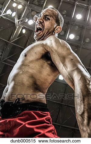 Bald male athlete in a fighting pose View Large Photo Image Stock Photography - Bald male athlete in a fighting pose. Fotosearch