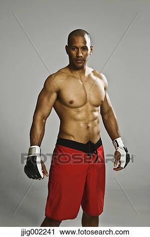 Stock Image - Bald male fighter. Fotosearch