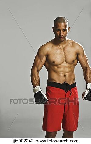 Stock Image - Bald male fighter. Fotosearch