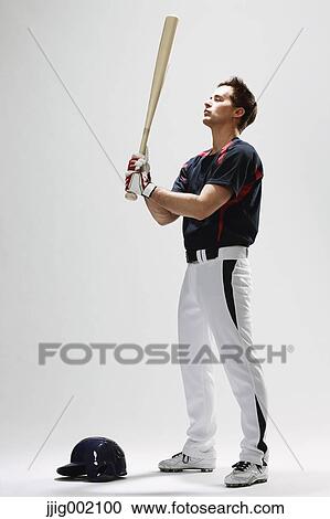 Baseball batter against white background View Large Photo Image Stock Image - Baseball batter against white background. Fotosearch
