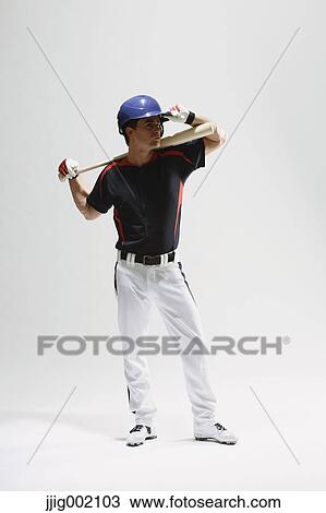 Baseball batter against white background View Large Photo Image Stock Image - Baseball batter against white background. Fotosearch
