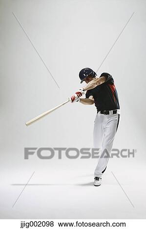 Baseball batter against white background View Large Photo Image Stock Photo - Baseball batter against white background. Fotosearch