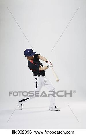 Baseball batter against white background View Large Photo Image Stock Photograph - Baseball batter against white background. Fotosearch