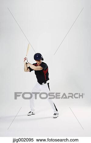 Baseball batter against white background View Large Photo Image Stock Photography - Baseball batter against white background. Fotosearch
