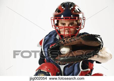 Baseball catcher against white background View Large Photo Image Picture - Baseball catcher against white background. Fotosearch