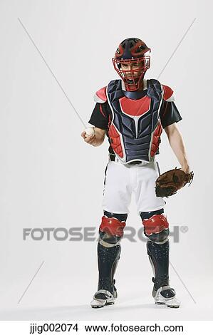 Baseball catcher against white background View Large Photo Image Picture - Baseball catcher against white background. Fotosearch