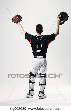 Baseball catcher against white background View Large Photo Image Stock Image - Baseball catcher against white background. Fotosearch