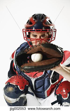 Baseball catcher against white background View Large Photo Image Stock Image - Baseball catcher against white background. Fotosearch