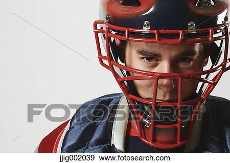Stock Photo - Baseball catcher against white background. Fotosearch