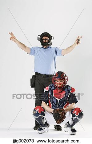 Baseball catcher and chief referee against white background View Large Photo Image Stock Photo - Baseball catcher and chief referee against white background. Fotosearch