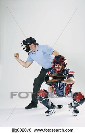 Baseball catcher and chief referee against white background View Large Photo Image Stock Photograph - Baseball catcher and chief referee against white background. Fotosearch