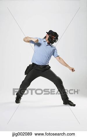 Stock Photo - Baseball chief referee against white background. Fotosearch