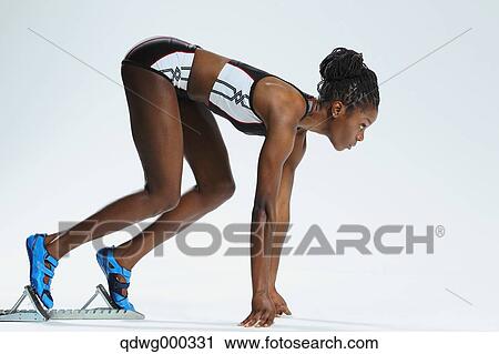 Female Athlete at Starting Block View Large Photo Image Stock Image - Female Athlete at Starting Block . Fotosearch