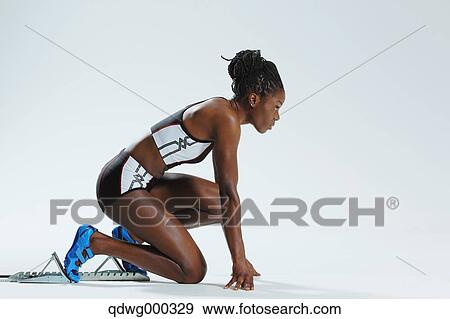 Female Athlete at Starting Block View Large Photo Image Stock Photo - Female Athlete at Starting Block . Fotosearch
