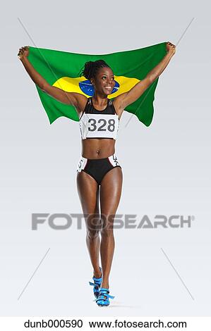 Female Athlete Holding a Brazilian Flag View Large Photo Image Stock Image - Female Athlete Holding a Brazilian Flag. Fotosearch