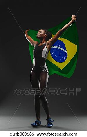 Female Athlete Holding a Brazilian Flag View Large Photo Image Stock Photography - Female Athlete Holding a Brazilian Flag. Fotosearch