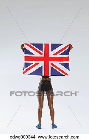 Female Athlete Holding A British Flag, Back View View Large Photo Image Picture - Female Athlete Holding A British Flag, Back View. Fotosearch